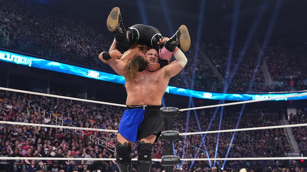 Samoa Joe hitting a Muscle Buster to Hangman Page at AEW Revolution 2024