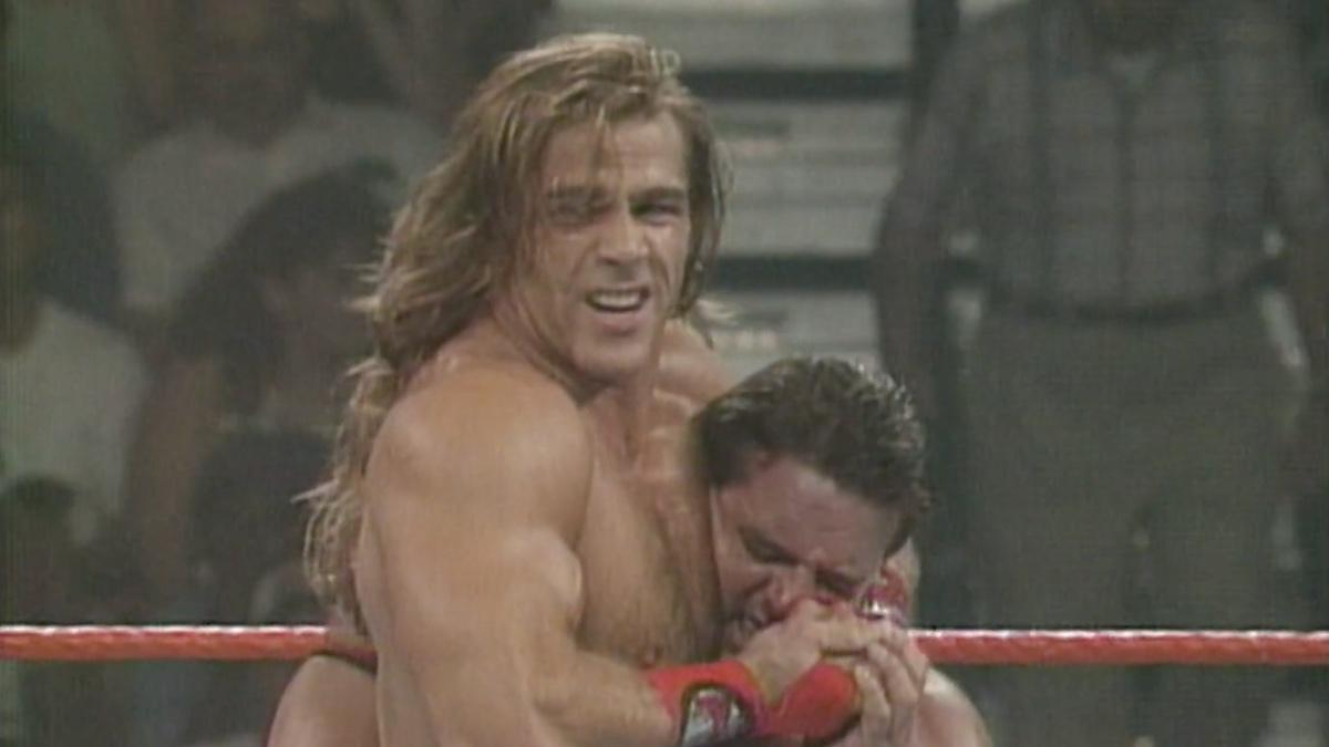Shawn Michaels with a sleeper hold applied to Davey Boy Smith