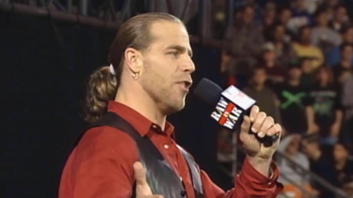 Shawn Michaels in a red shirt and leather waistcoat on January 4, 1999 episode of WWE RAW