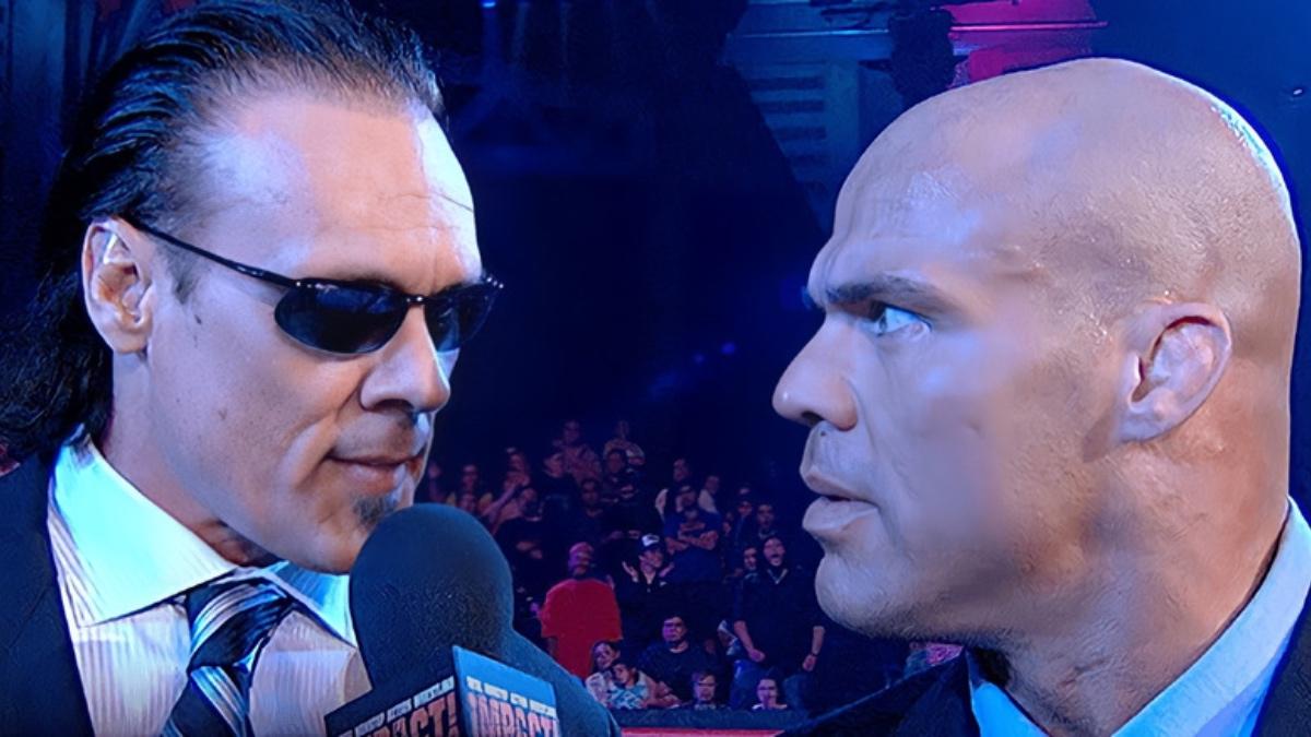 Sting and Kurt Angle looking at each other in TNA