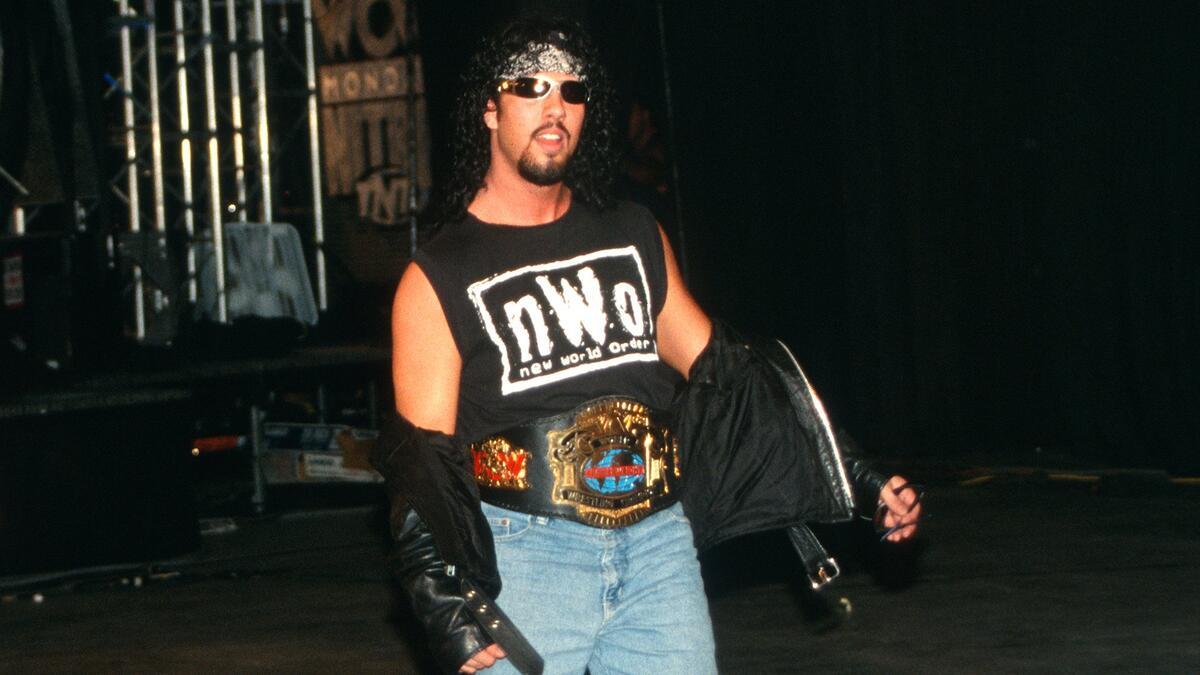 Syxx wearing the WCW Cruiserweight Title and NWO t-shirt