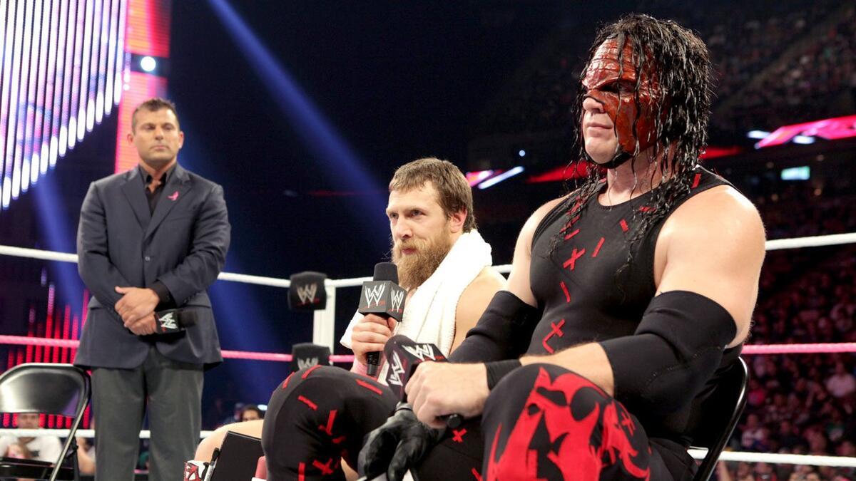 Team Hell No sitting in the centre of the ring angry with each other