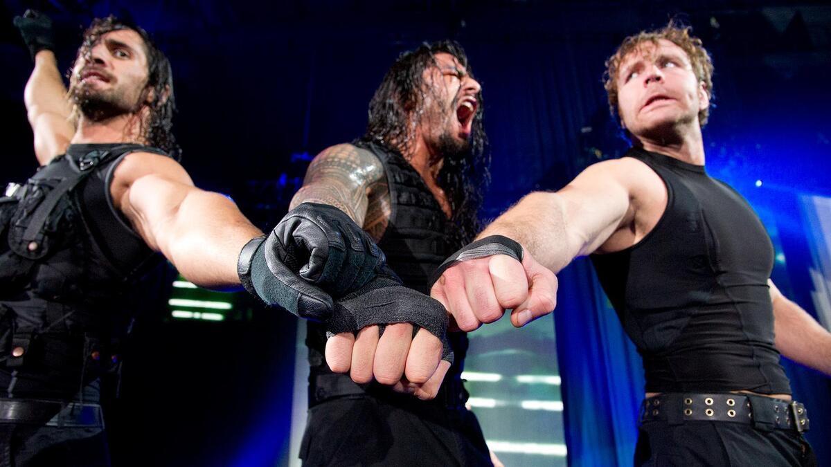 The Shield posing with their fists together