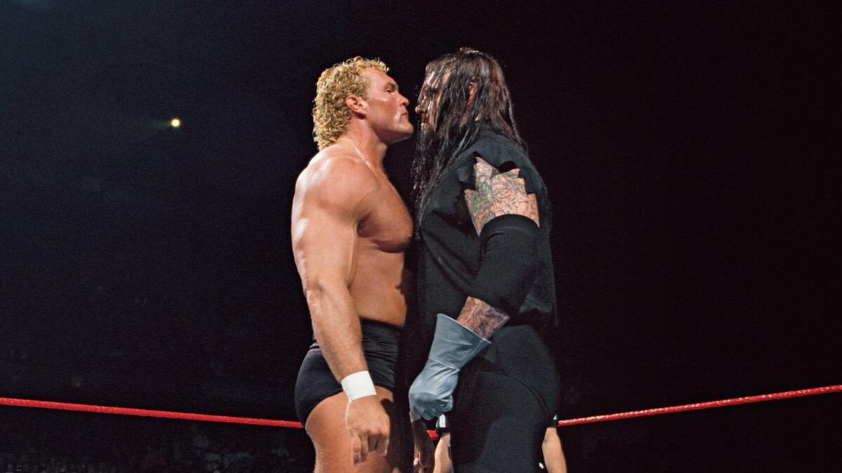 The Undertaker and Sycho Sid standing nose to nose at WWE WrestleMania 13
