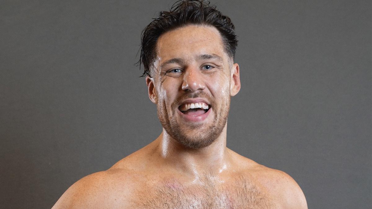 Trevor Lee smiling during a photo shoot