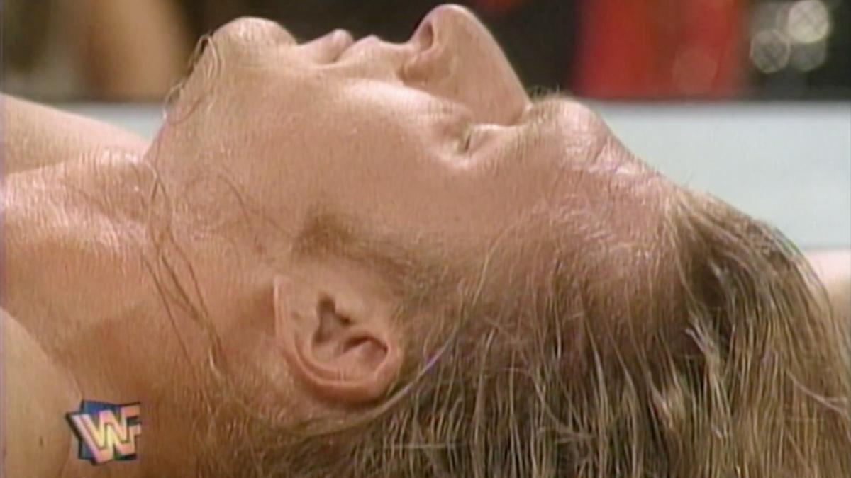 Triple H lying down with his eyes closes at WWF In Your House 8: Beware of Dog