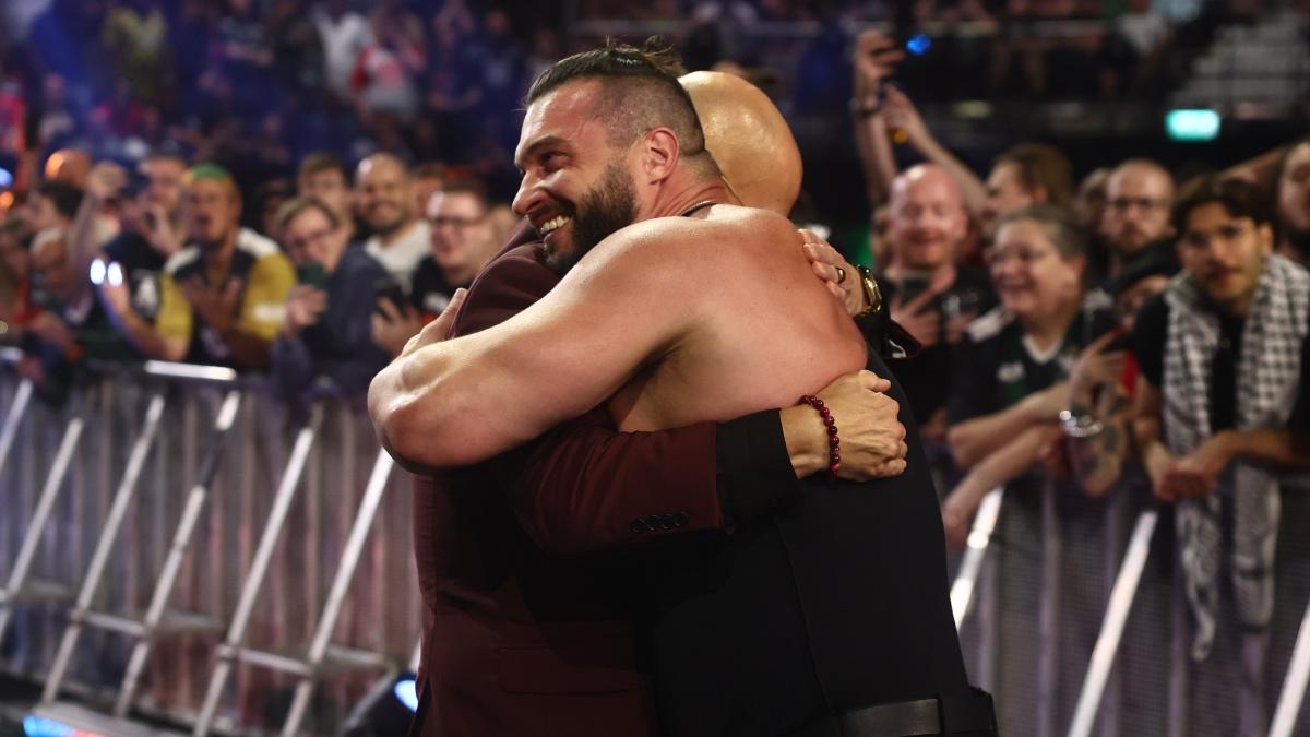 Wardlow and Don Callis hugging at AEW x NJPW Forbidden Door 2025