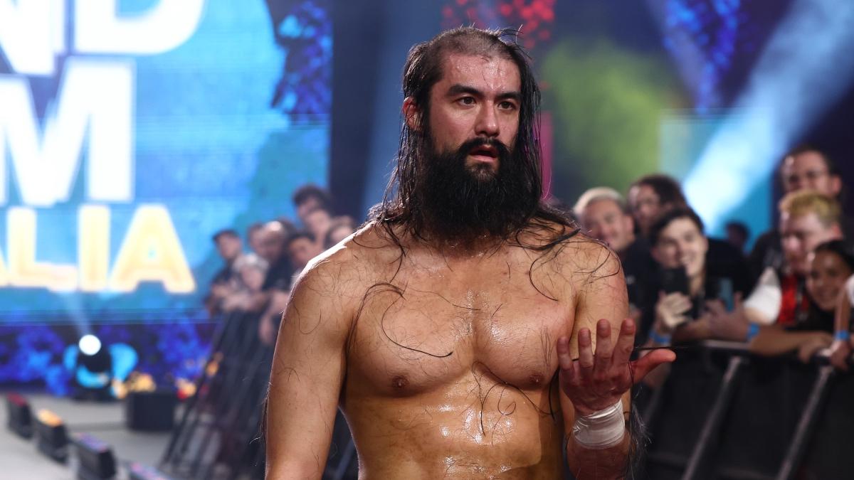 Wheeler Yuta with the top of his head shaved looking shocked at AEW Grand Slam Australia