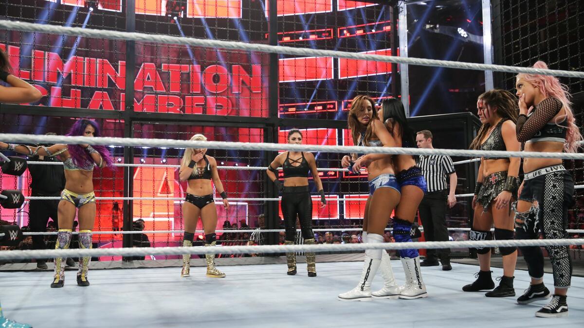 Each team facing off inside the Chamber at WWE Elimination Chamber 2019