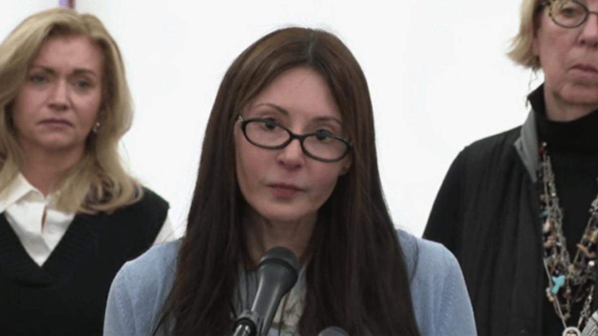 Janel Grant speaking pubicly 