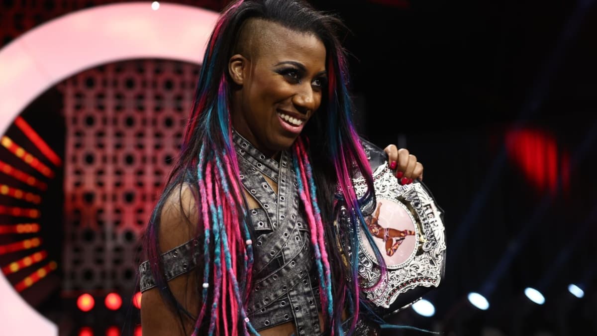 Athena smiling as ROH Women's World Champion