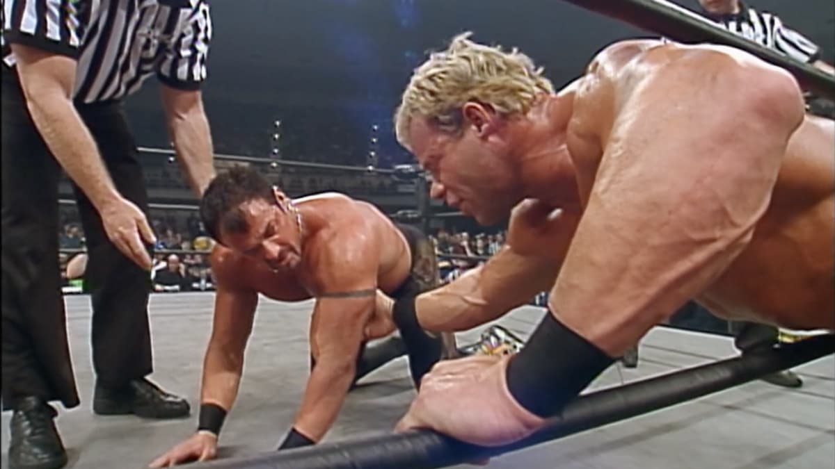 Buff Bagwell and Lex Luger chatting at WCW Greed while on their hands and knees