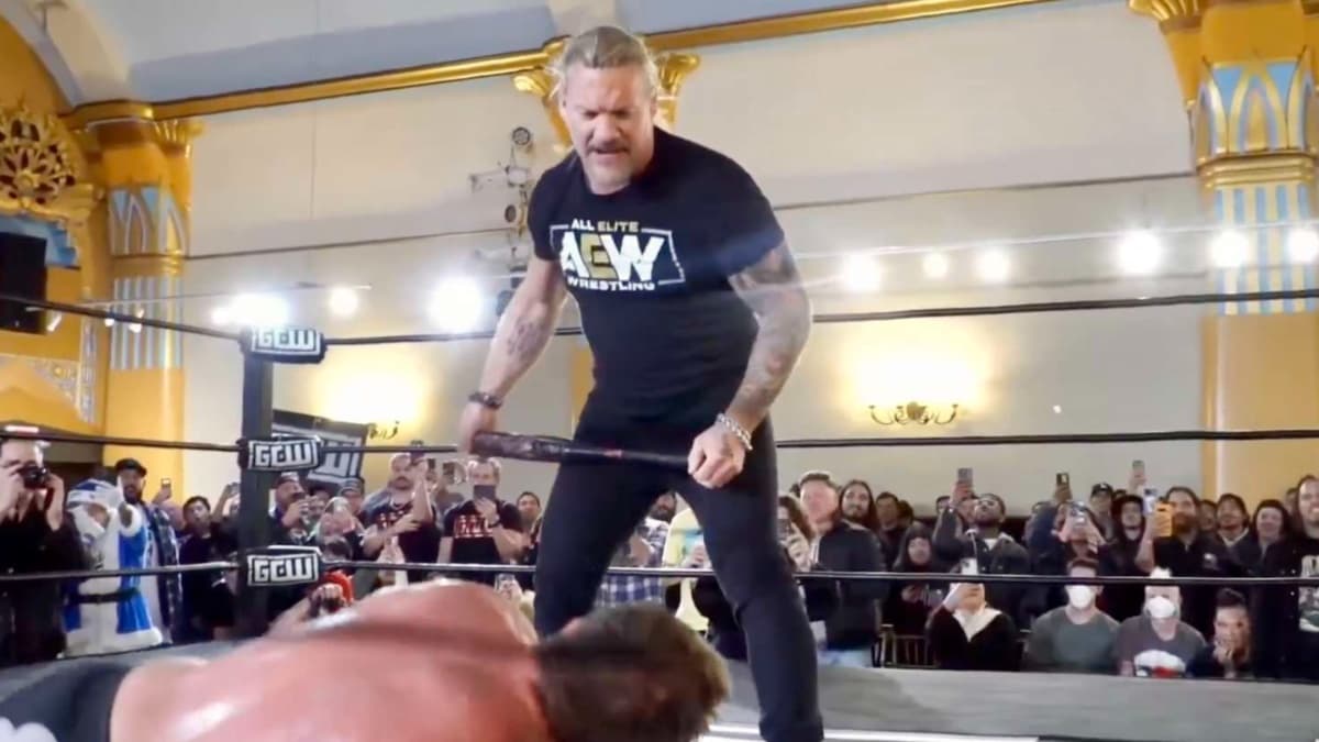 Chris Jericho holding a baseball bat in a GCW ring
