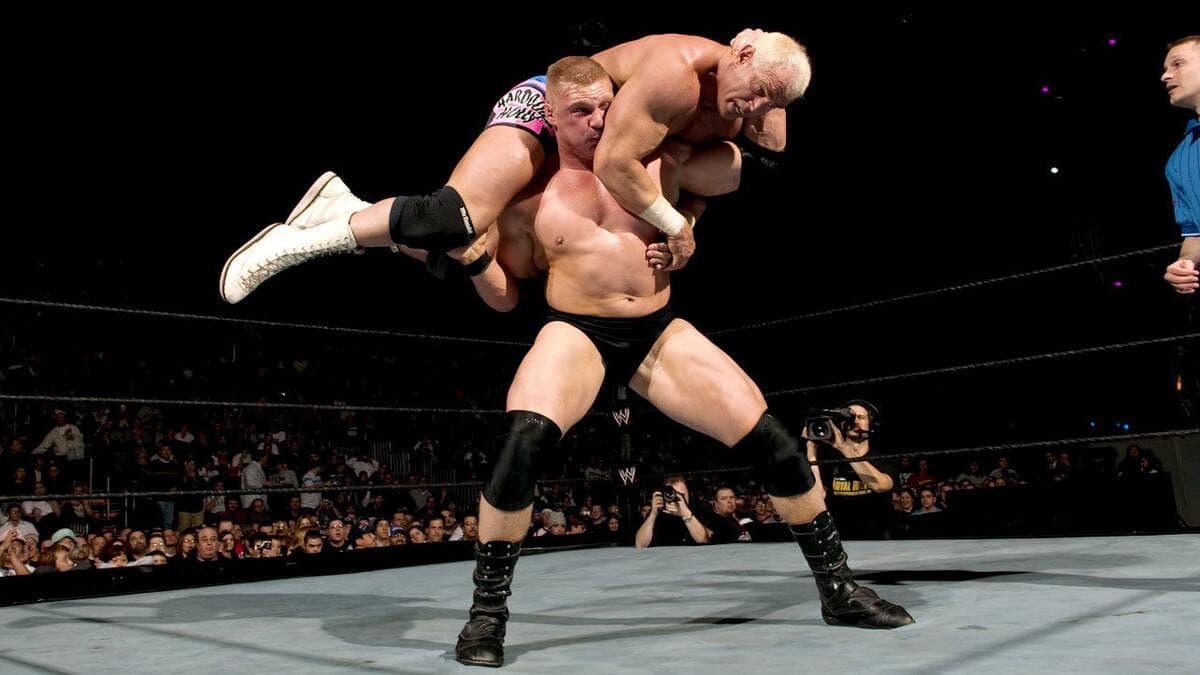 Brock Lesnar delivering an F5 to Hardcore Holly at WWE Royal Rumble 2004