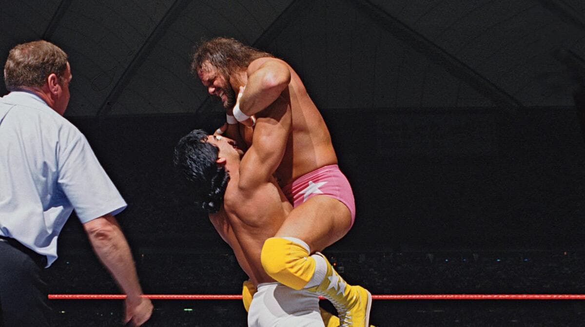 Ricky Steamboat and Randy Savage grappling at WWE WrestleMania III