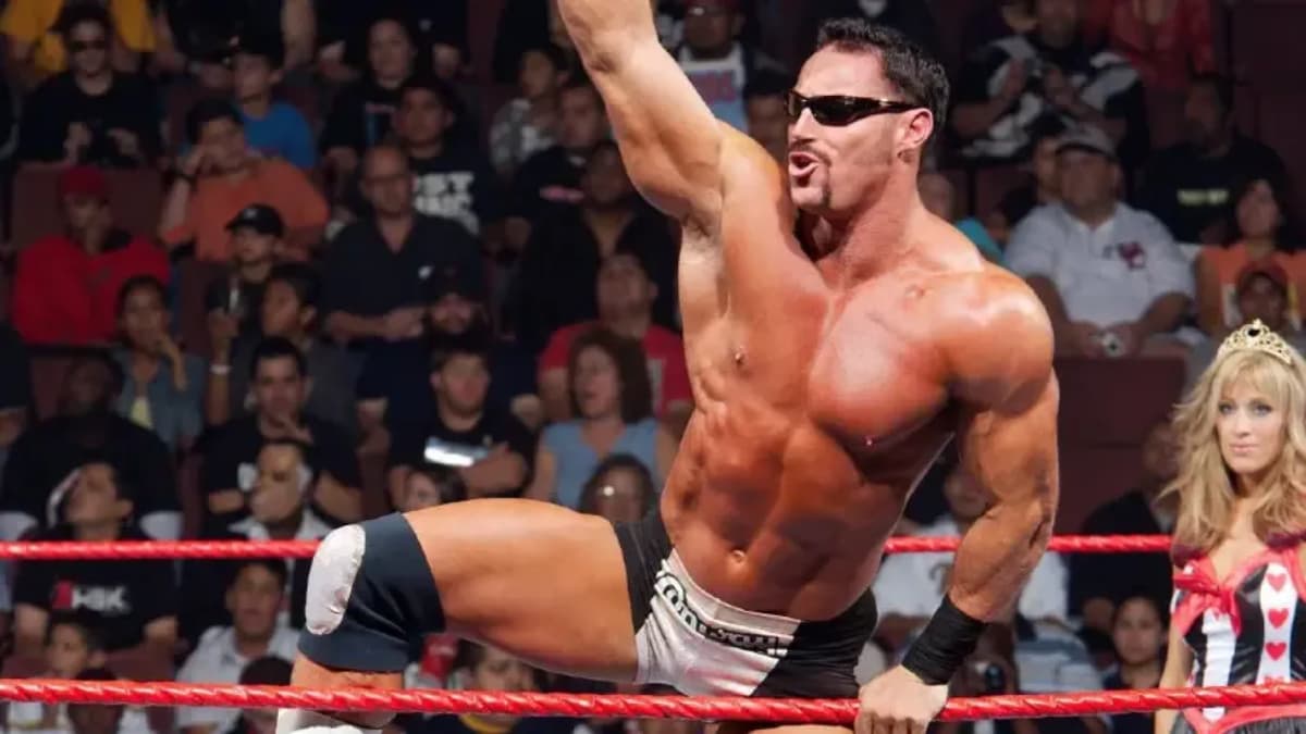 Rob Conway flexing on the ropes