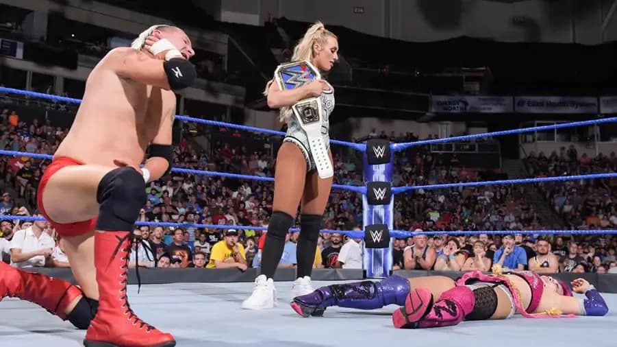 https://cultaholic.com/files/images/13c75800646cadcfb332b34f81a7afd1f6f08168-carmella-asuka-james-ellsworth.jpg