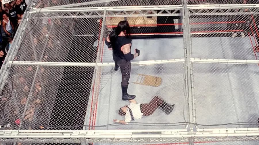 https://cultaholic.com/files/images/17e026a8594708f919ead6062312f95a751cf85a-the-undertaker-mankind.jpg