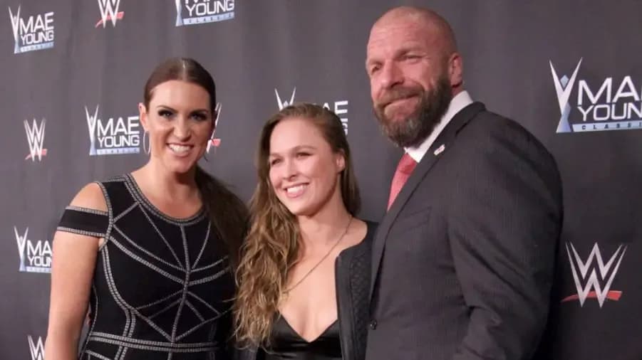 https://cultaholic.com/files/images/4068eaa893cd974a14c14b5b084b7268f4b2675e-ronda-rousey-stephanie-mcmahon-triple-h.jpg