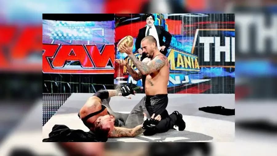 https://cultaholic.com/files/images/5509f0e9a429ebf569c1e4c2855390fe4148b6cc-cm-punk-urn-the-undertaker.jpg