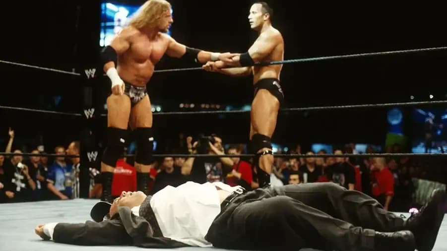 https://cultaholic.com/files/images/56d6e52d4f3718ee4f6260959582fbf7731829b4-the-rock-triple-h-paul-heyman-global-warning-2002.jpg