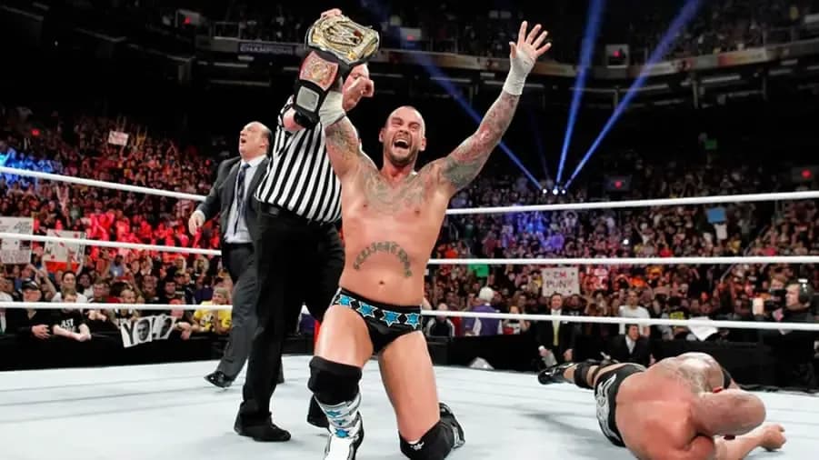 https://cultaholic.com/files/images/5d6e960e55e0865cab676a05f4a1a8960dc428f5-the-rock-royal-rumble-2013-cm-punki.jpg