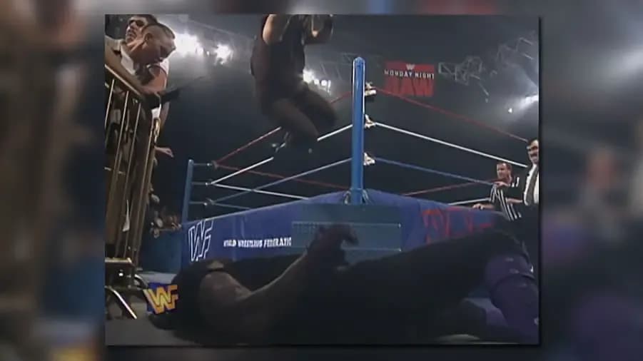 https://cultaholic.com/files/images/964de7cbed33909885f40c06a5c7319cb1320352-the-undertaker-mankind.jpg