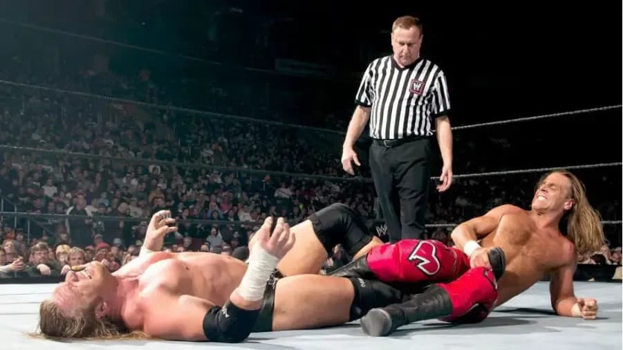 https://cultaholic.com/files/images/a4aac779249c51b30ab645edf3b102deeb1d3f30-triple-h-shawn-michaels-royal-rumble-2004.jpg