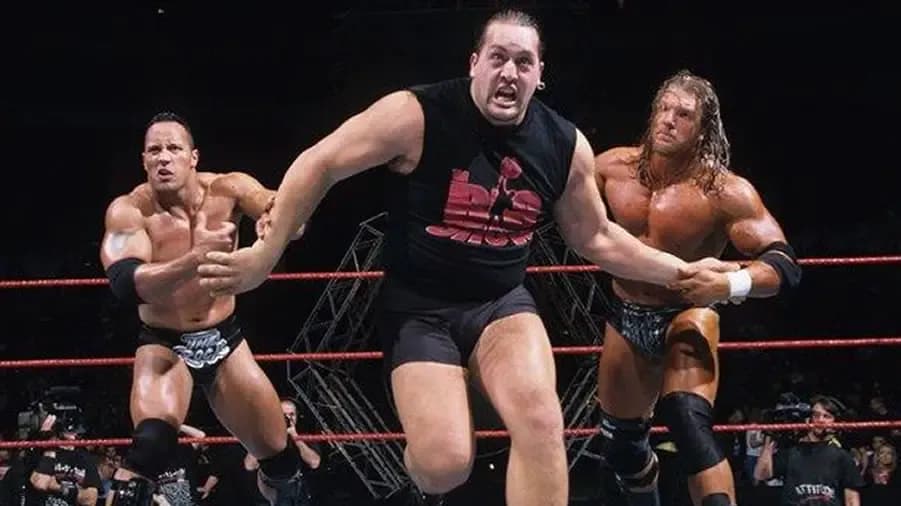 https://cultaholic.com/files/images/a96ae2d3d62311ab0b78408862a28f09cc534d5b-big-show-triple-h-tyhe-rock-survivor-series-1999.jpg