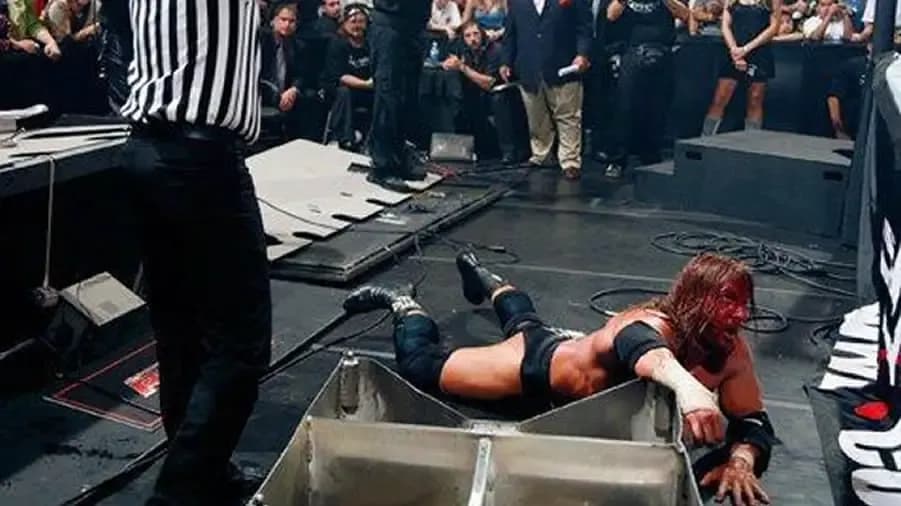 https://cultaholic.com/files/images/b002d1f7c148a704c440e7587687a43a8933f8e9-triple-h-no-mercy-2007.jpg