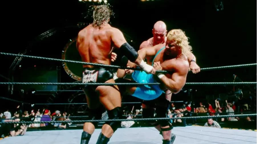 https://cultaholic.com/files/images/b1c897918132b4954f1d5e5be318fa1d039bb7b3-stone-cold-steve-austin-triple-h-mr-perfect-royal-rumble-2002.jpg