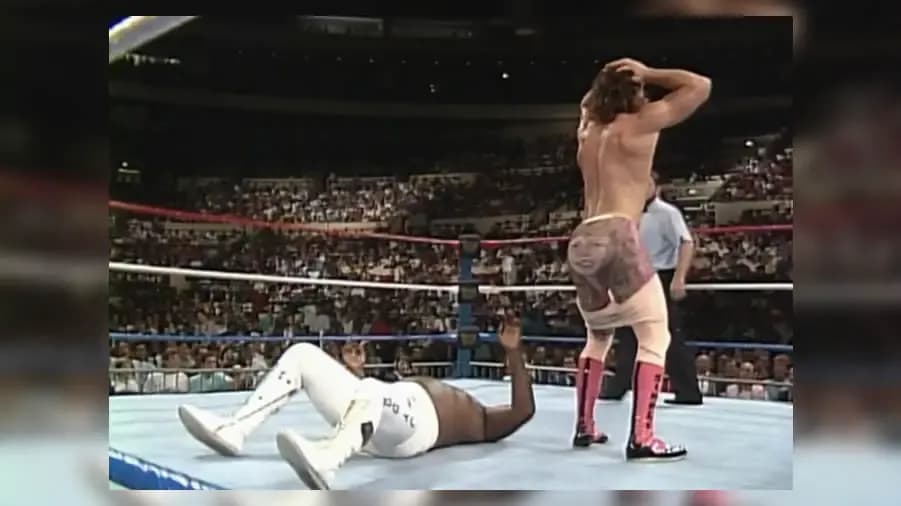 https://cultaholic.com/files/images/c1ff1a9e48c11f2393750594875feb4035ed0529-rick-rude-junkyard-dog.jpg