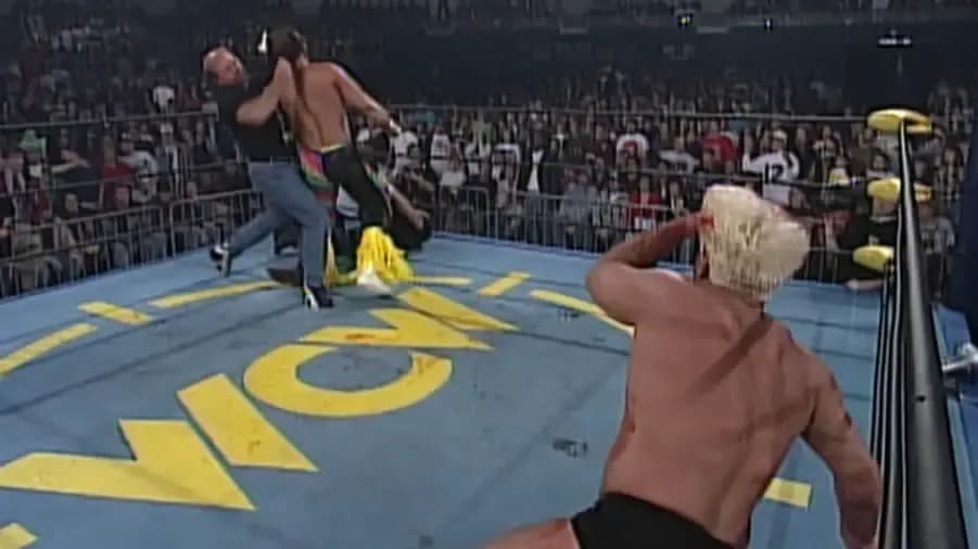 https://cultaholic.com/files/images/c910b62ab11c8b4a9f8afa9beb37f06c00769852-ric-flar-randy-savage-arn-anderson-starrcade-1995.jpg