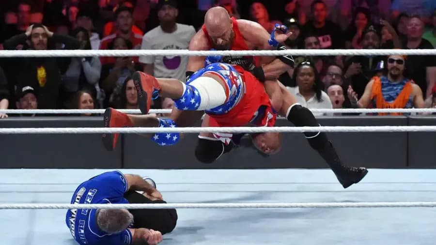https://cultaholic.com/files/images/ed3d7a1eaf8c412fcf1f7290613abfb78343fedd-triple-h-kurt-angle-shane-mcmahon-survivor-series-.jpg