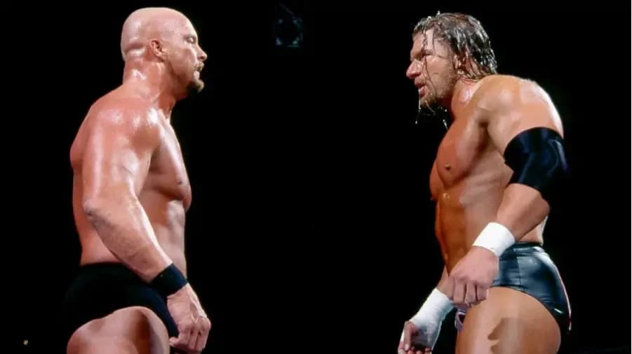 https://cultaholic.com/files/images/eea8fd497a94488d3a1da2b6dc336f593944ce5a-stone-cold-steve-austin-triple-h-royal-rumble-2002.jpg