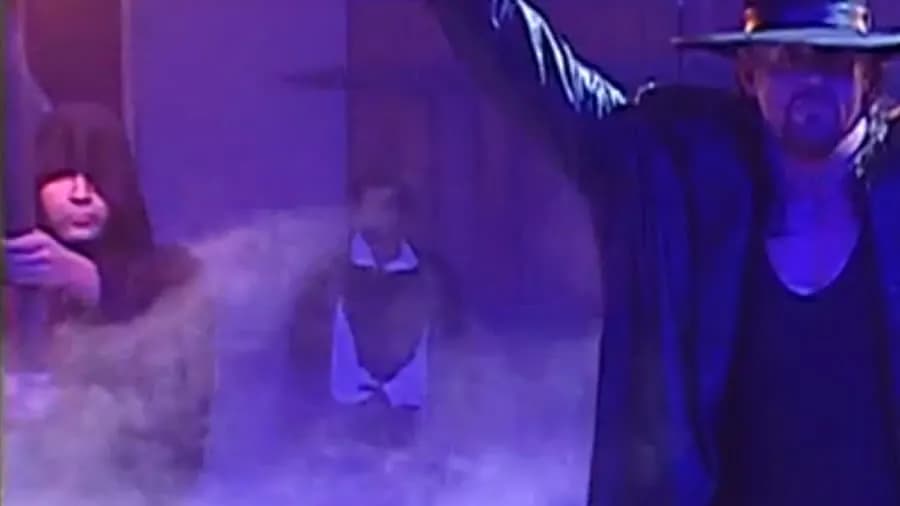 https://cultaholic.com/files/images/efffe45f58e11e02a4d4ad75f84538fdcb769592-Dean-Ambrose-the-undertaker-royal-rumble-2006.jpg