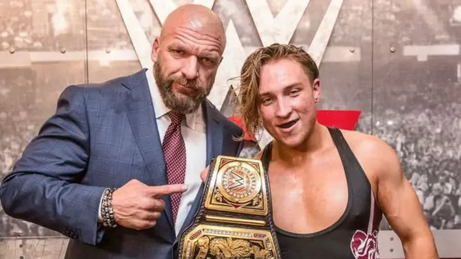https://cultaholic.com/files/images/fab80264f2d8efd9ad25caf421c78156d9224c74-Triple-H-Pete-Dunne.jpg