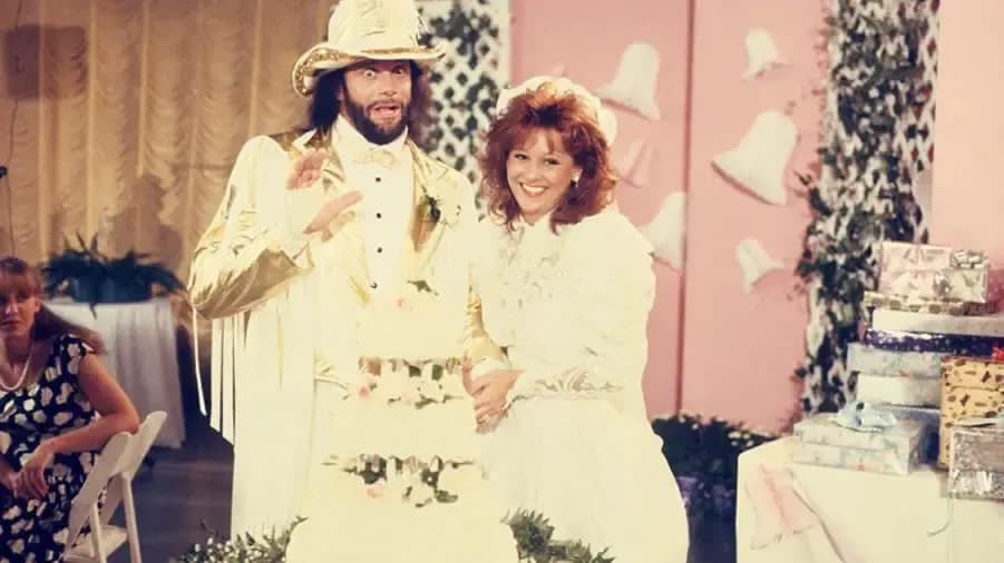 https://cultaholic.com/files/images/fb9bea96badee48c0c2613a353b2f8dafdc57c75-randy-savage-elizabeth-summerslam-1991.jpg