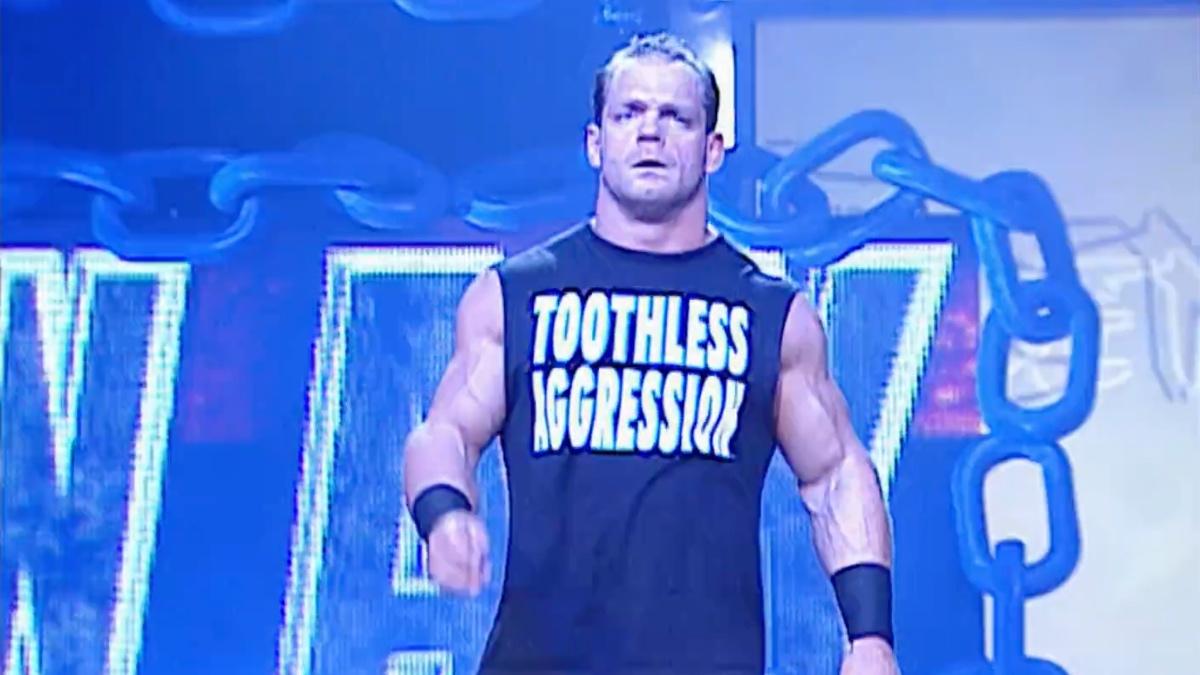 Chris Benoit walking to the ring wearing a Toothless Aggression vest