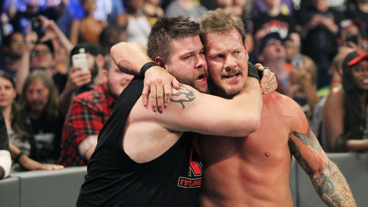 Chris Jericho and Kevin Owens hugging at WWE SummerSlam 2016