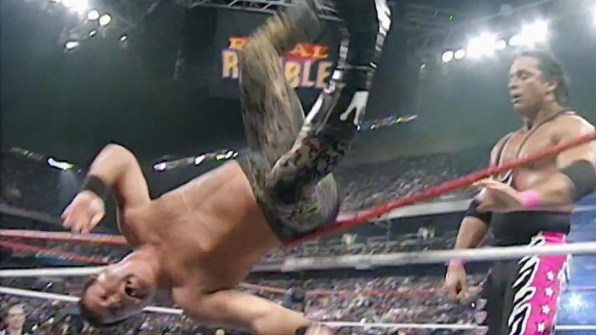 Jerry Lawler sailing over the top rope following a punch from Bret Hart at WWE Royal Rumble 1997