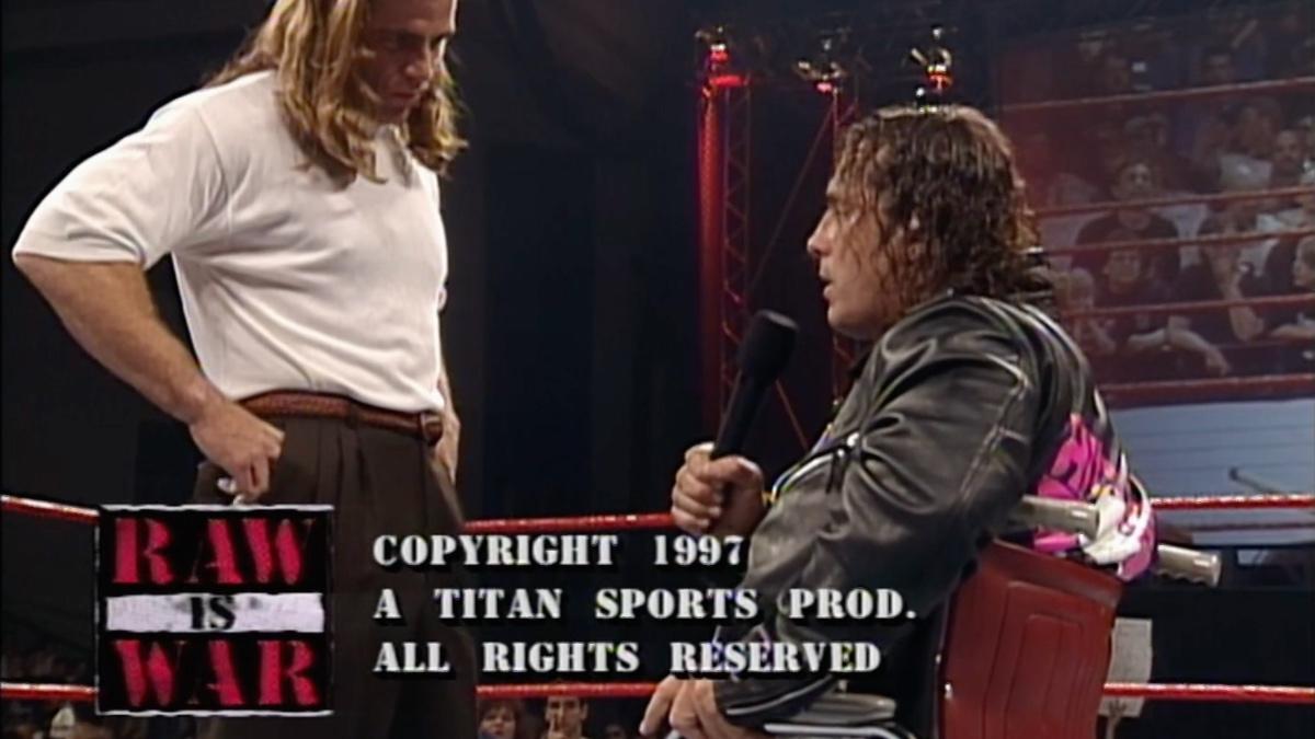 Bret Hart shouting at Shawn Michaels from a wheeler chair on May 12, 1997 episode of WWE Raw