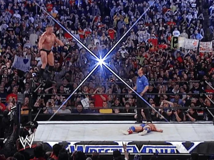 https://cultaholic.com/files/images/08b0d104ad8c1fc5d162a07279b41bafd8429bfb-brock-lesnar-kurt-angle-shooting-star-wrestlemania-19.gif