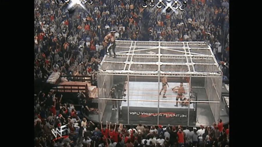 https://cultaholic.com/files/images/0ae38fcbb838a472f7943b075e326e08c856c9d7-rikishi-undertaker-armageddon-2000-hell-in-a-cell.gif