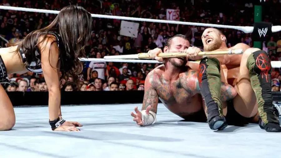 https://cultaholic.com/files/images/2f1e386d3954f352c37af8654093c0dbb432b5ab-aj-lee-cm-punk-daniel-bryan.jpg