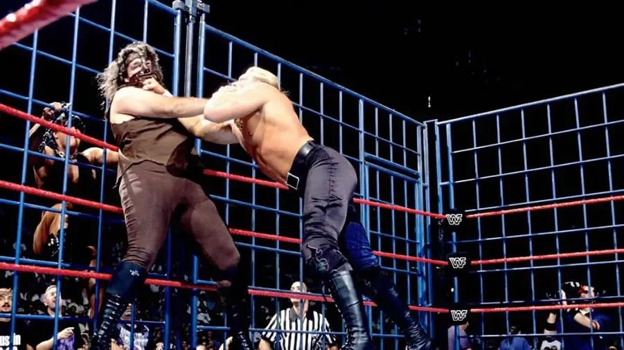 https://cultaholic.com/files/images/8070b2f56db595cd54c4b828de00518574e69dd6-mankind-triple-h-summerslam-1997.jpg