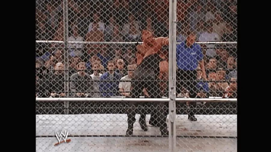 https://cultaholic.com/files/images/875ac9b89548e4afba443e1907a4c77b83c00f4e-brock-lesnar-the-undertaker-no-mercy-2002-hell-in-a-cell.gif