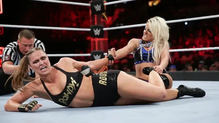 https://cultaholic.com/files/images/8d24d0ba9714caa574490c4a2ec33f6b73c8c6da-ronda-rousey-alexa-bliss.jpg