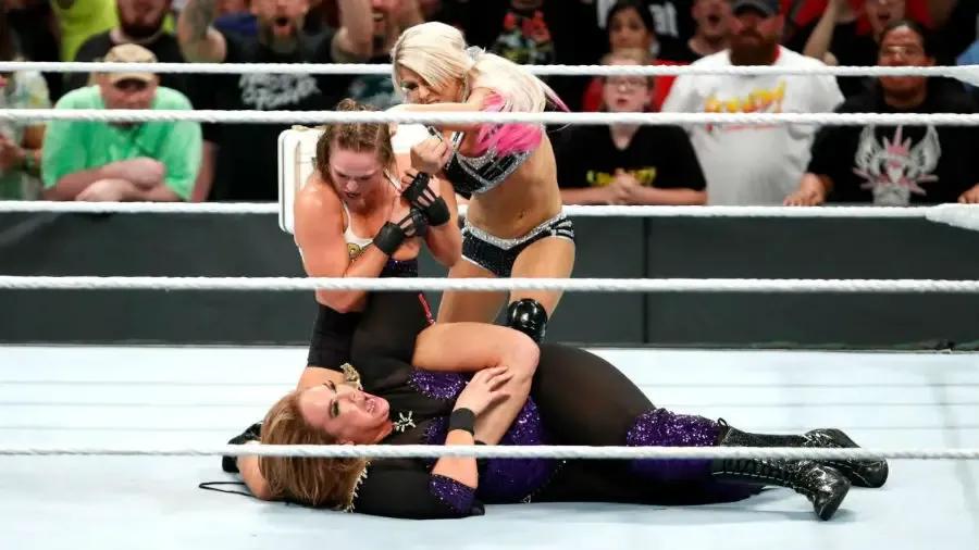 https://cultaholic.com/files/images/94f3c0e88d06d0b6a545b51efb57ba39569bb7cd-Nia-Jax-Ronda-Rousey-Alexa-Bliss.jpg