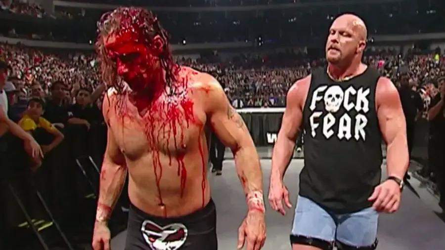 https://cultaholic.com/files/images/bf0b07819b5a880f465b07189fe4da2d74f87651-shawn-michaels-stone-cold-steve-austin-survivor-series-2003.jpg